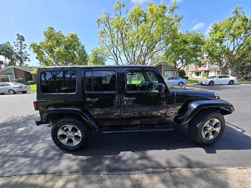 Black 2017 Jeep Wrangler Unlimited Sahara
