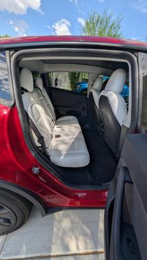Red 2025 Tesla Model Y Long Range AWD