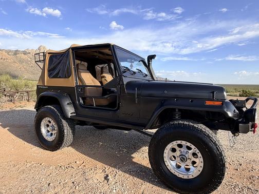 Black 1995 Jeep Wrangler SE 4WD
