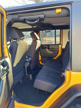 Orange 2013 Jeep Wrangler Unlimited Sport