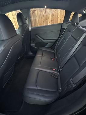 Black 2023 Tesla Model Y Performance