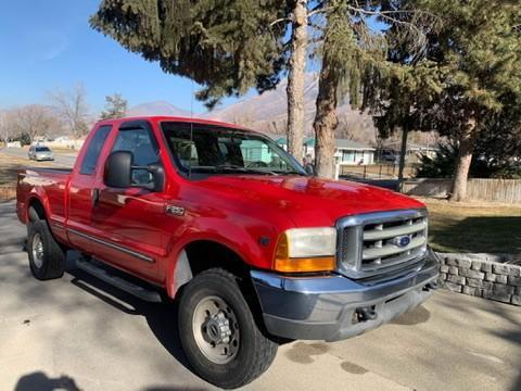 Red 1999 Ford F-250 XL SuperCab Super Duty
