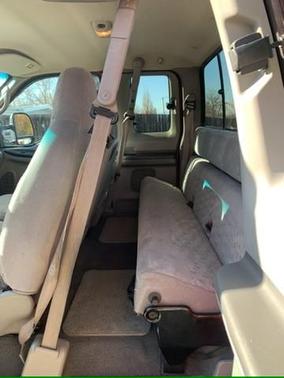 Red 1999 Ford F-250 XL SuperCab Super Duty