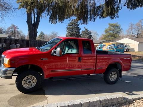 Red 1999 Ford F-250 XL SuperCab Super Duty