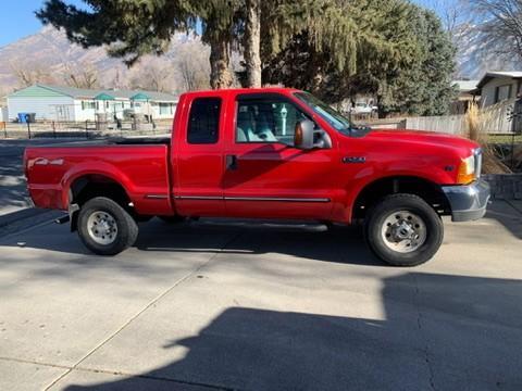 Red 1999 Ford F-250 XL SuperCab Super Duty