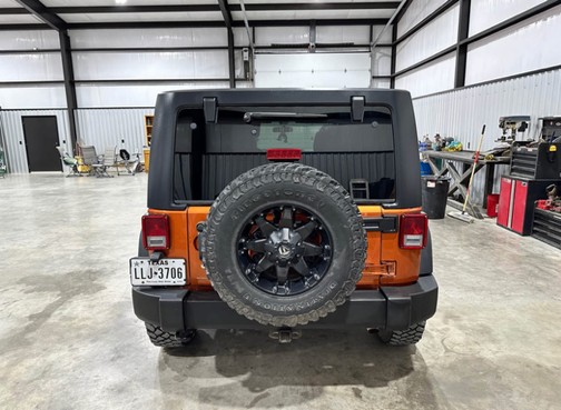 Orange 2011 Jeep Wrangler Unlimited Sport