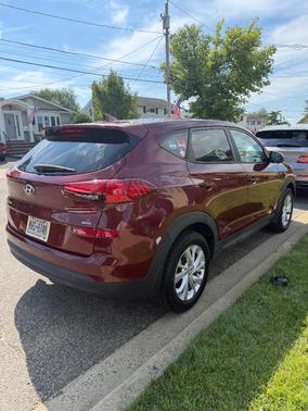 Red 2019 Hyundai TUCSON SE