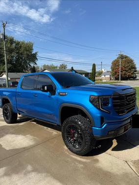 Blue 2024 GMC Sierra 1500 AT4