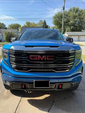 Blue 2024 GMC Sierra 1500 AT4