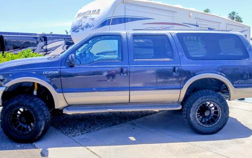 Blue 2000 Ford Excursion Limited 4WD