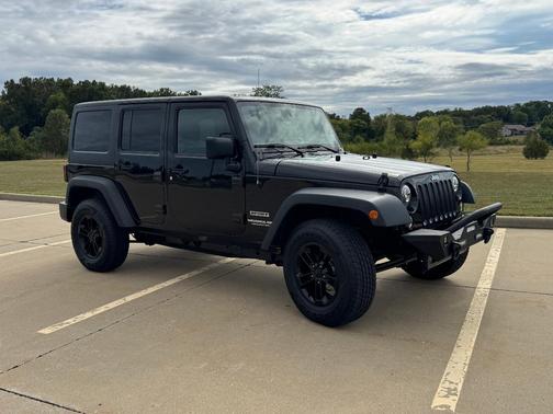 Black 2015 Jeep Wrangler Unlimited Sport