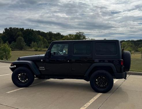 Black 2015 Jeep Wrangler Unlimited Sport