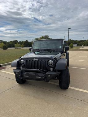 Black 2015 Jeep Wrangler Unlimited Sport