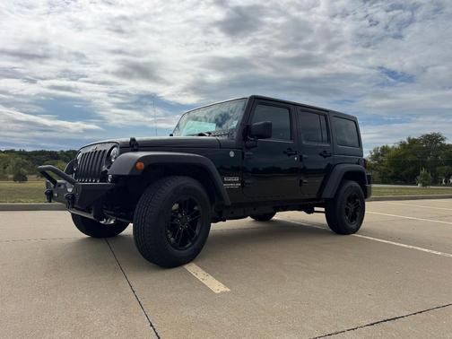 Black 2015 Jeep Wrangler Unlimited Sport