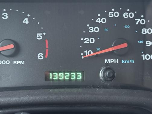 Red 2002 Jeep Wrangler Sahara