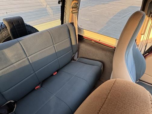 Red 2002 Jeep Wrangler Sahara