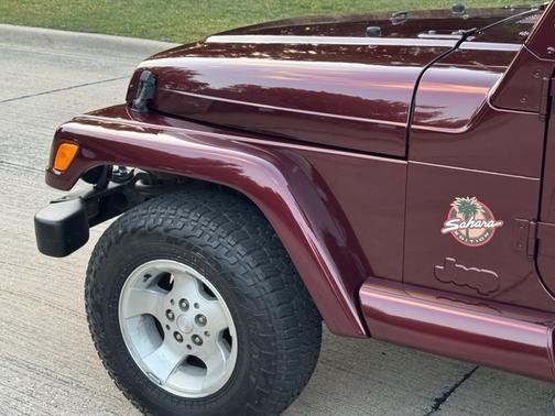 Red 2002 Jeep Wrangler Sahara