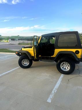 Yellow 2006 Jeep Wrangler Sport