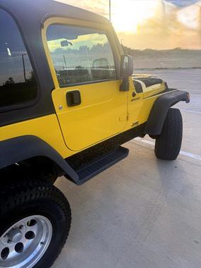 Yellow 2006 Jeep Wrangler Sport