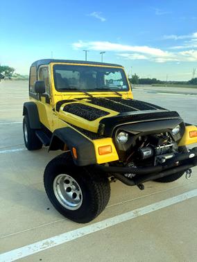 Yellow 2006 Jeep Wrangler Sport