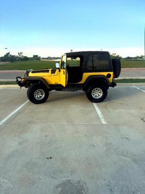 Yellow 2006 Jeep Wrangler Sport