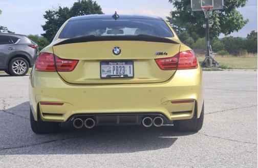 Yellow 2015 BMW M4 Base