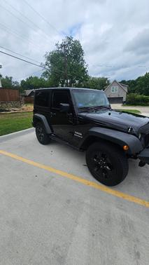 Black 2011 Jeep Wrangler Sport
