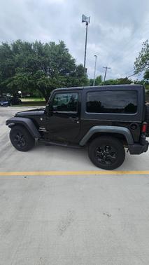 Black 2011 Jeep Wrangler Sport