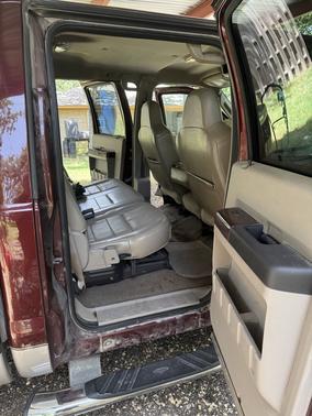 Red 2010 Ford F-250 Lariat Super Duty Crew Cab