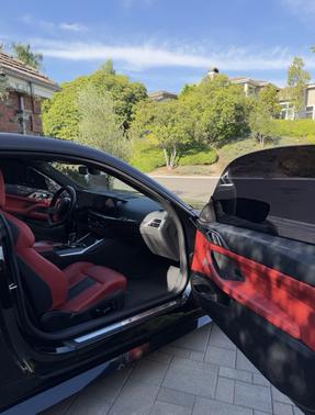 Black 2025 BMW M4 Competition xDrive