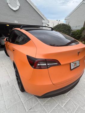 Orange 2023 Tesla Model Y Long Range