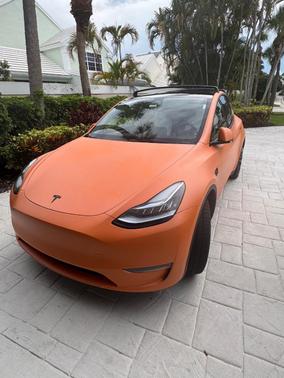 Orange 2023 Tesla Model Y Long Range