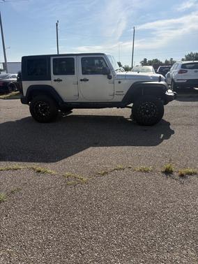 Silver 2010 Jeep Wrangler Unlimited Sport