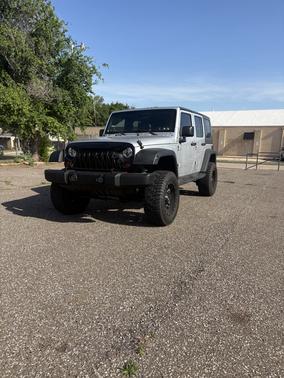 Silver 2010 Jeep Wrangler Unlimited Sport