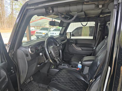 Black 2014 Jeep Wrangler Unlimited Sport