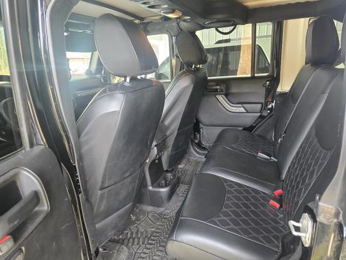 Black 2014 Jeep Wrangler Unlimited Sport
