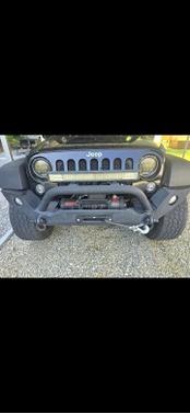Black 2014 Jeep Wrangler Unlimited Sport