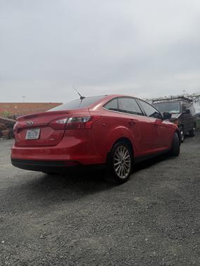 Red 2012 Ford Focus SEL