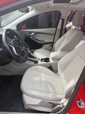 Red 2012 Ford Focus SEL