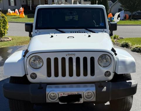 White 2015 Jeep Wrangler Sahara