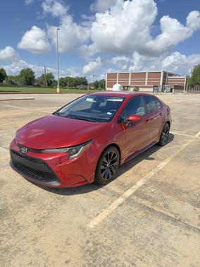 Red 2021 Toyota Corolla LE