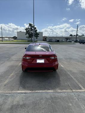Red 2021 Toyota Corolla LE