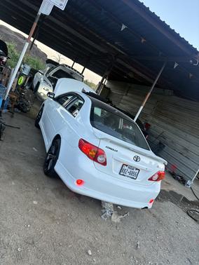 Beige 2010 Toyota Corolla S