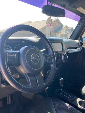 Gray 2017 Jeep Wrangler Unlimited Sahara