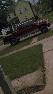 Red 2005 Ford F-250 XLT Crew Cab Super Duty