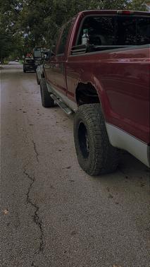 Red 2005 Ford F-250 XLT Crew Cab Super Duty