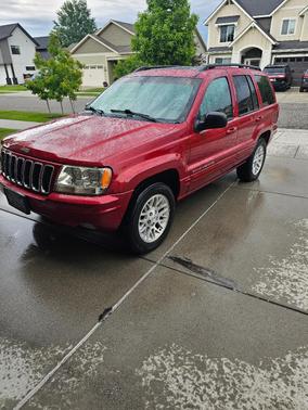 Red 2002 Jeep Grand Cherokee Limited
