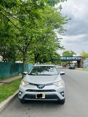 Silver 2016 Toyota RAV4 Hybrid XLE