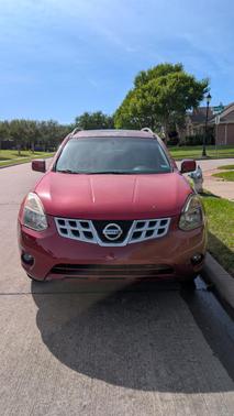 Red 2013 Nissan Rogue SV