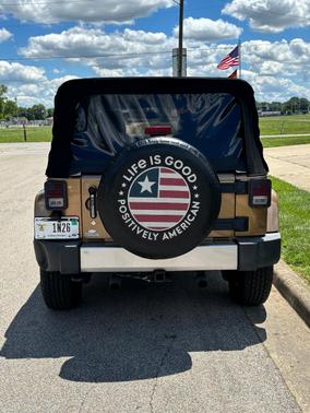 Gold 2015 Jeep Wrangler Unlimited Sahara